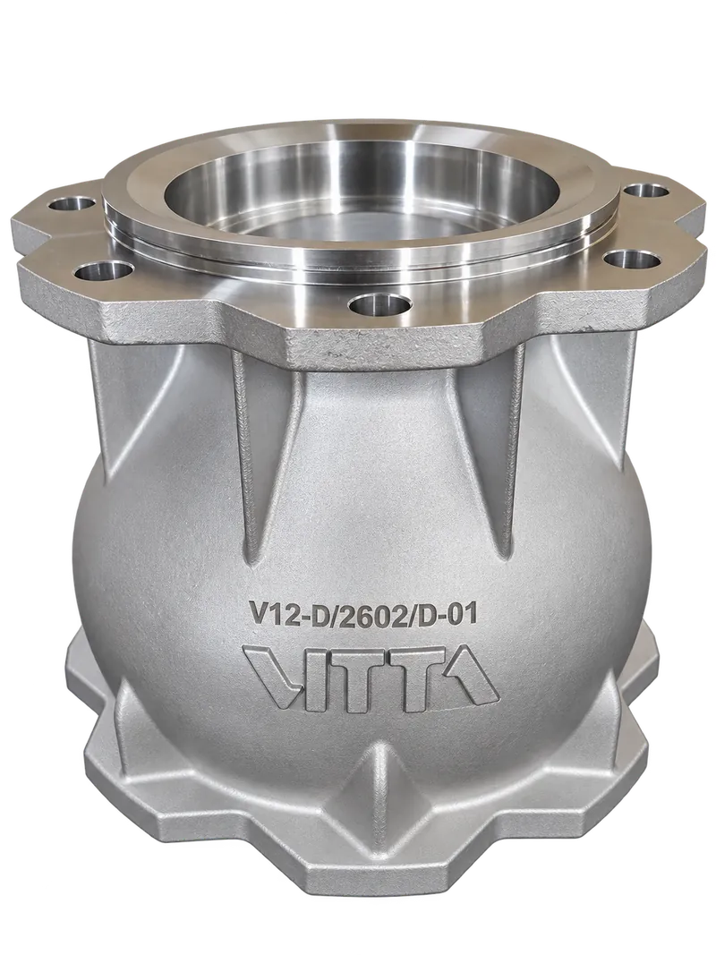 Cuerpo mecanizado de acero inoxidable con la referencia V12-D/2602/D-01 y el nombre VITTA marcados sobre la pieza.